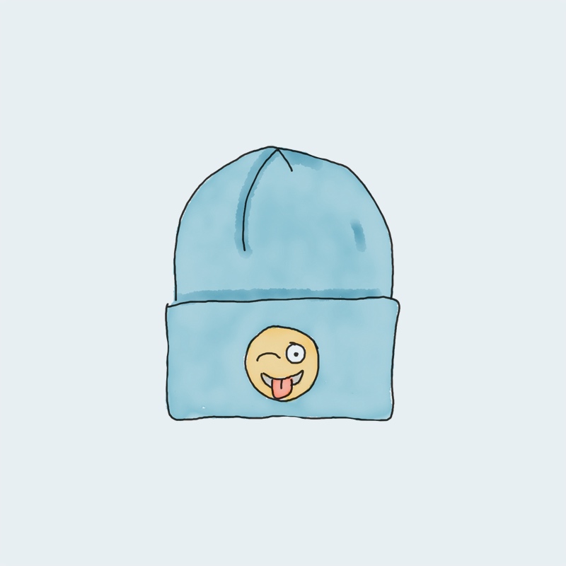 beanie-with-logo-1.jpg Gorro azul con un emoji sonriente sacando la lengua.